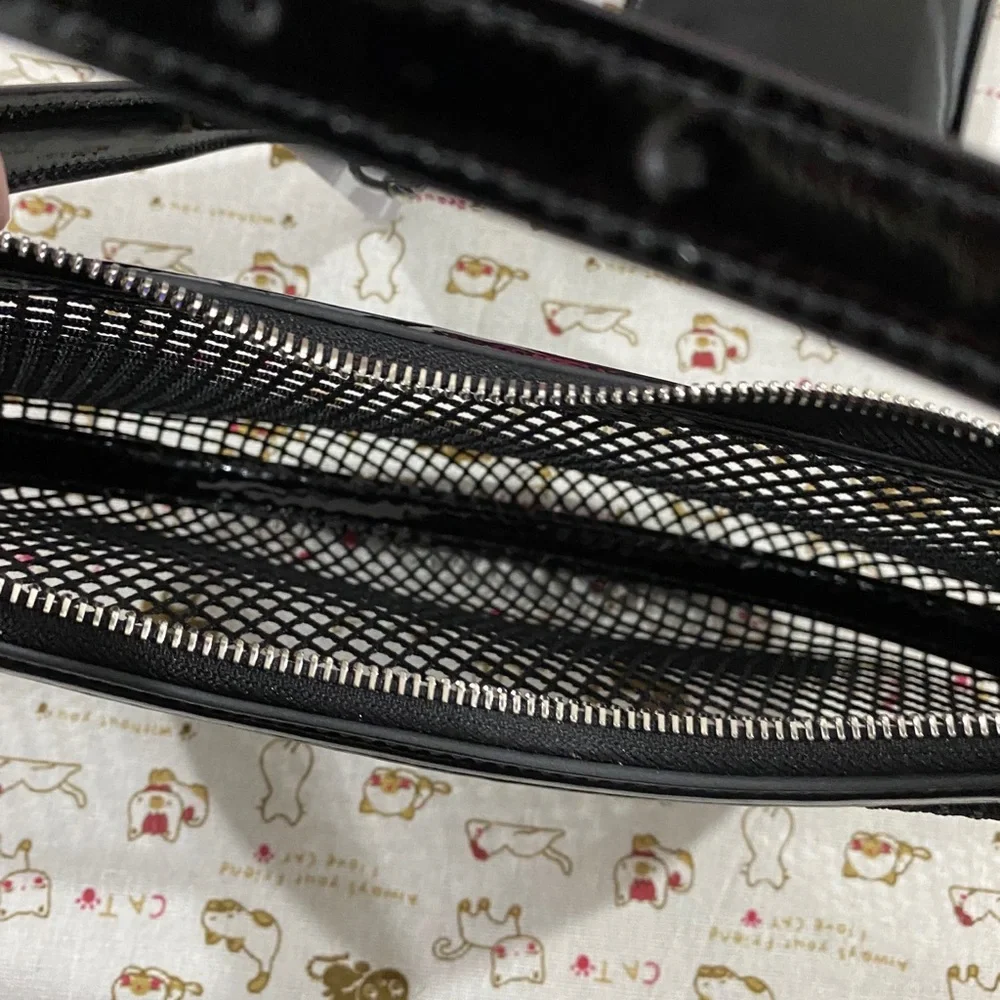 Alaïa Black Woven Crescent Shoulder Bag